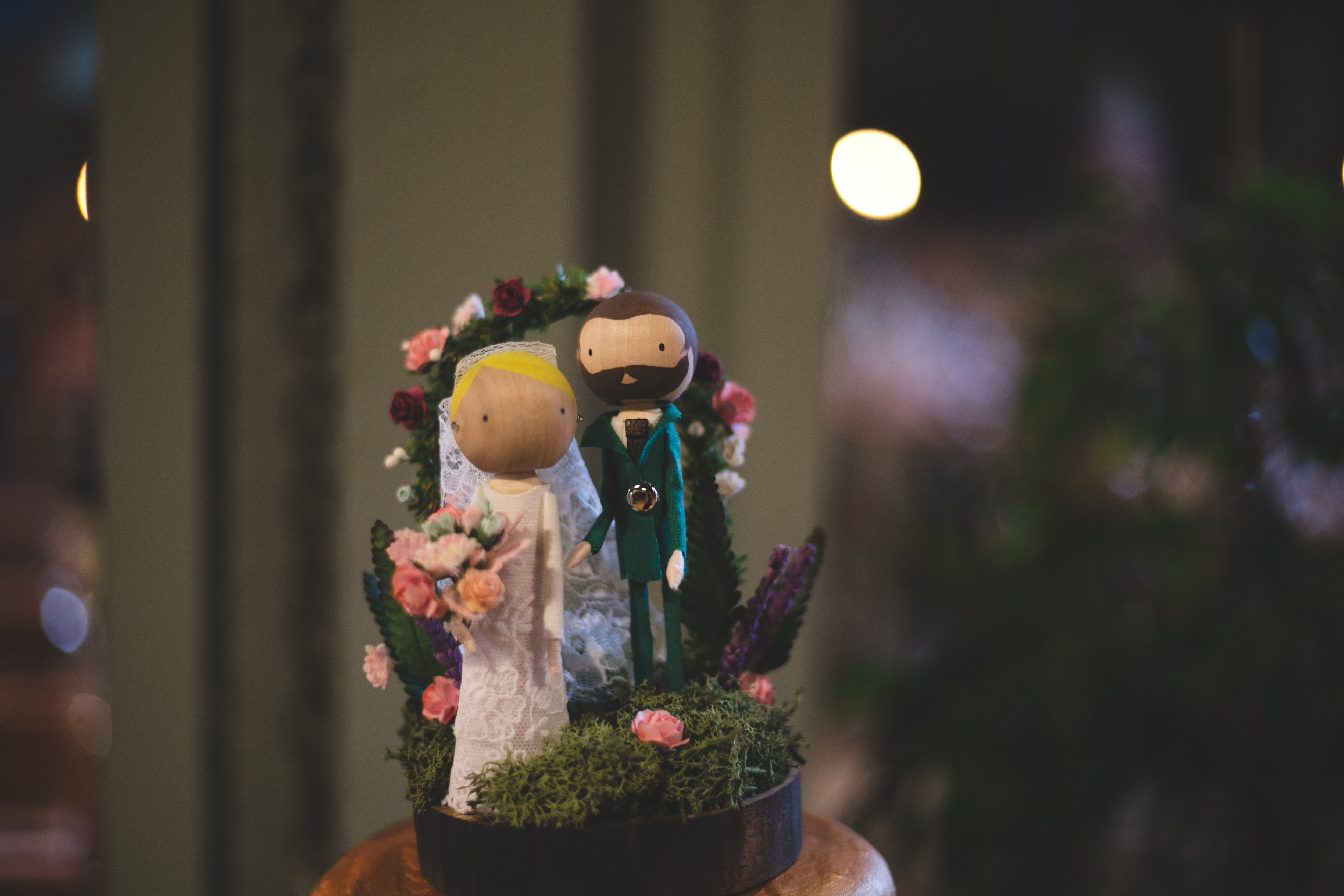 Cute bride and groom wedding cake toppers