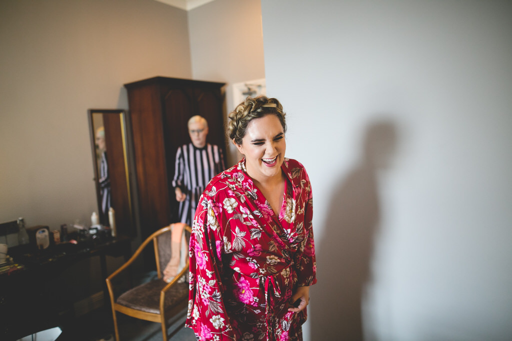 bride in red floral kimono style dressing gown